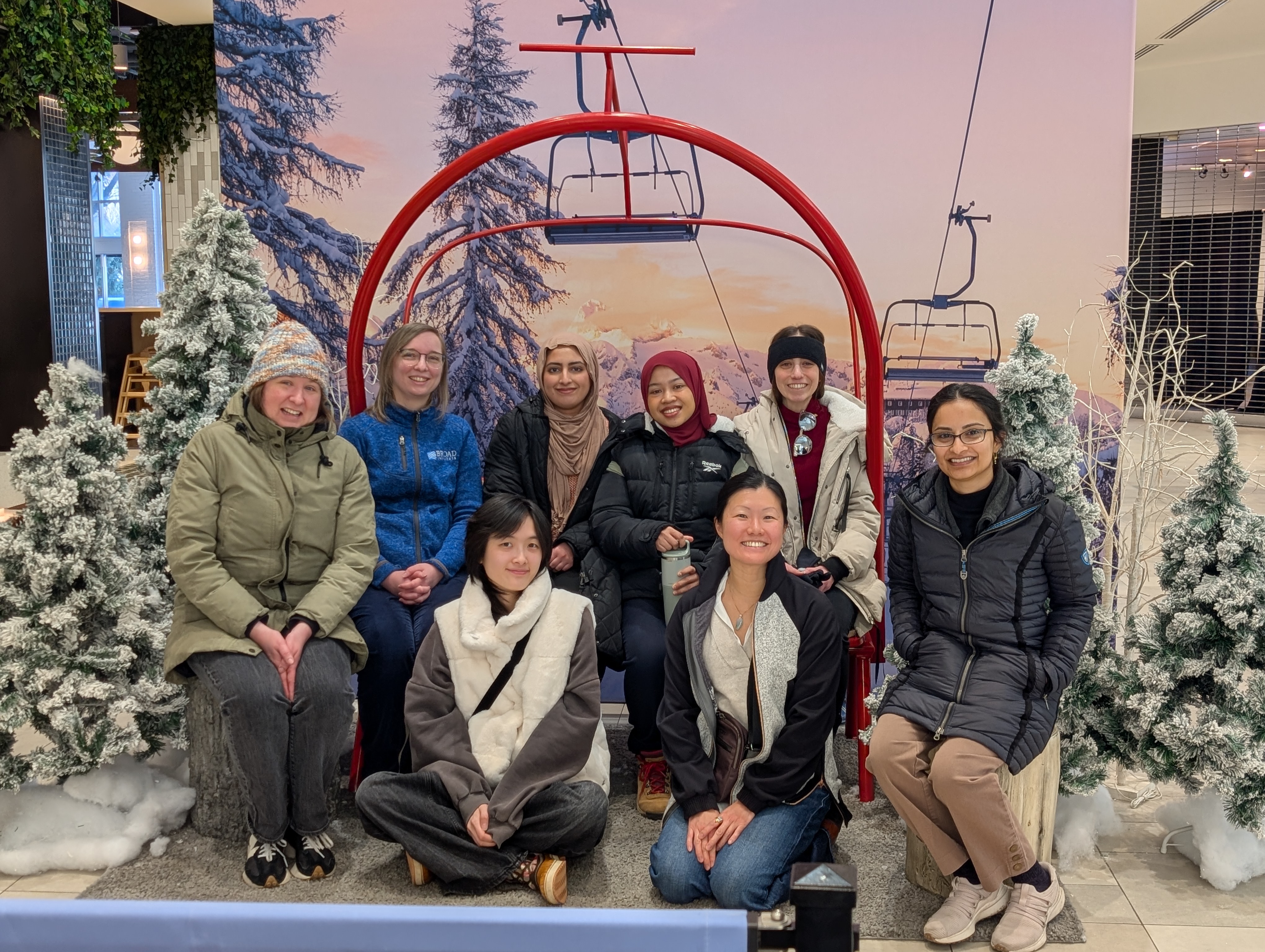 Group photo, ski lift backdrop